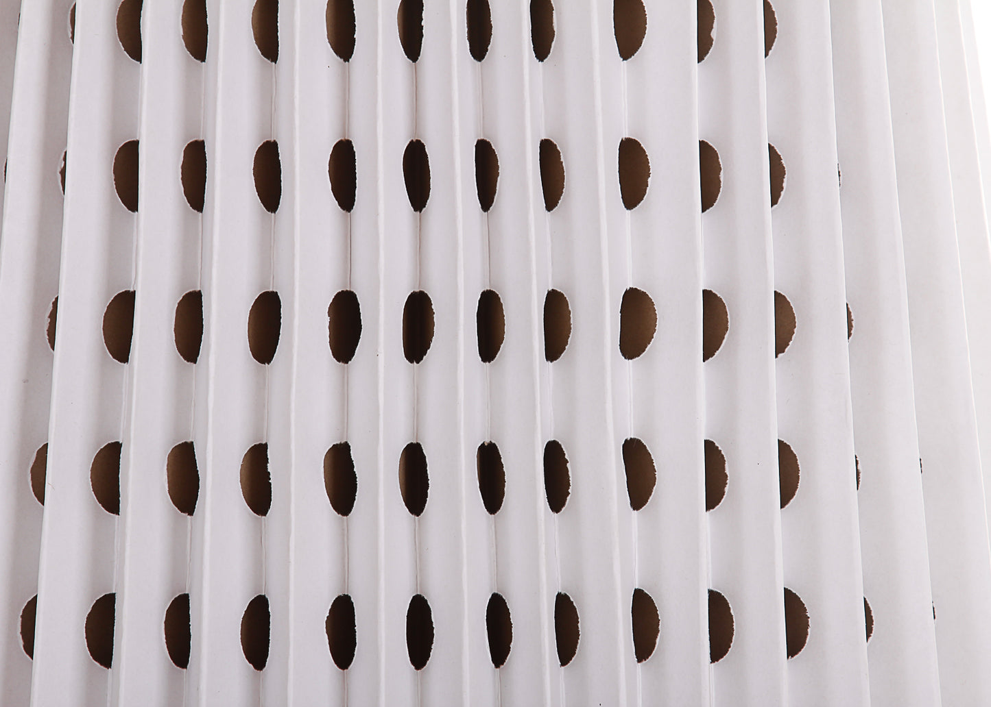 A close-up view of a white, pleated spray booth filter.