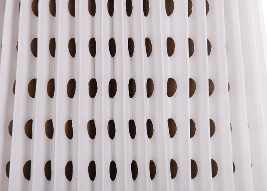 A close-up view of a white, pleated spray booth filter.