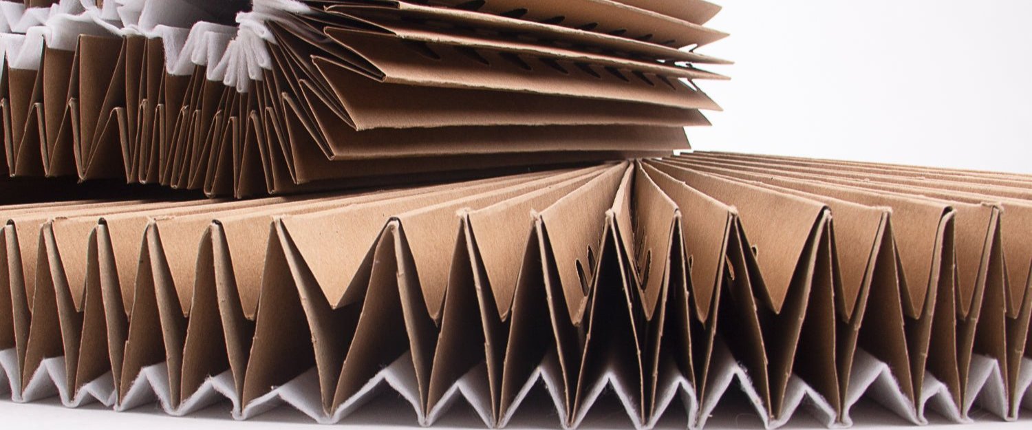 pleated cardboard paint filter with second layer to hold fine paint particles