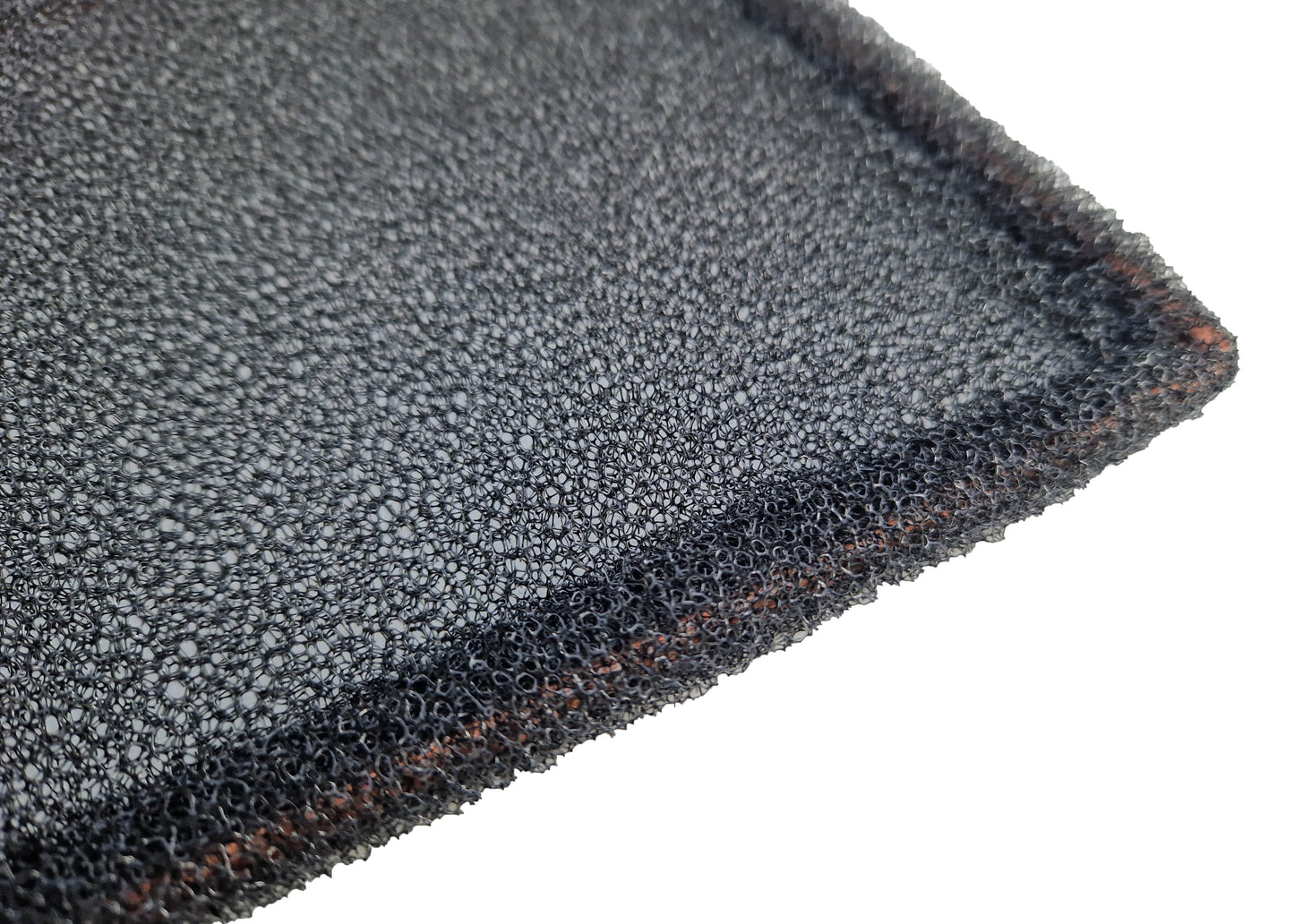 photo showing a close-up of the filtration mesh and how it is sealed around the edges of the metal frame of the washable filter air conditioning units