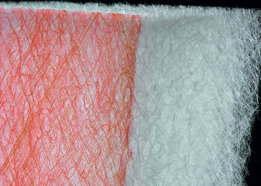 Close up photo of our impregnated paint stop that is designed for use with course dust particles. Roll is 125mm thick.